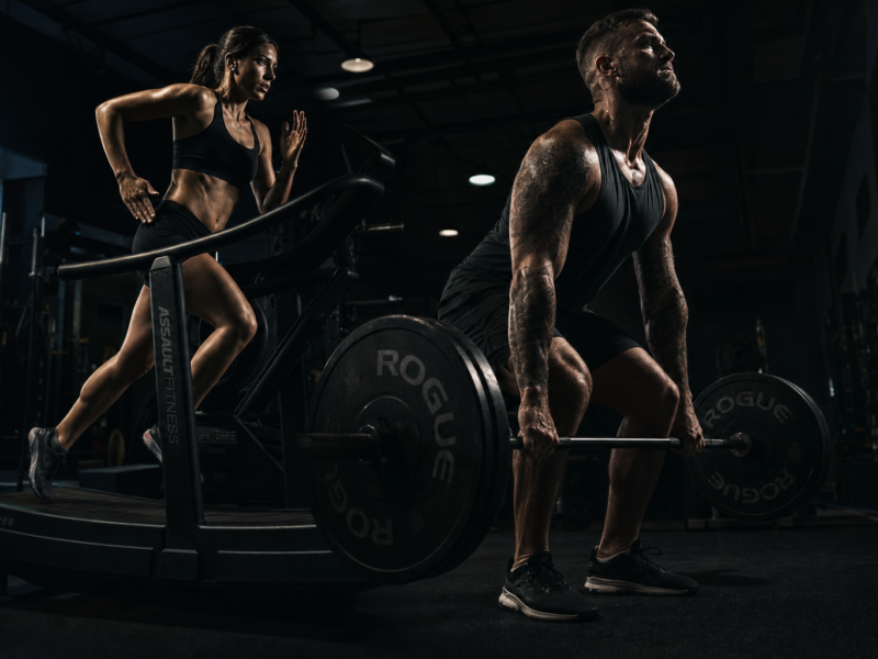 Split image concept of cardio running and strength training in a dark gym