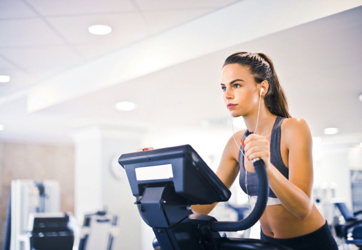 Woman running outdoors for weight loss
