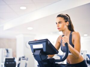 Woman running outdoors for weight loss