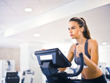 Woman running outdoors for weight loss