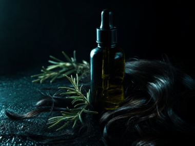 Does Mielle rosemary oil cause hair loss - dark moody hair oil editorial