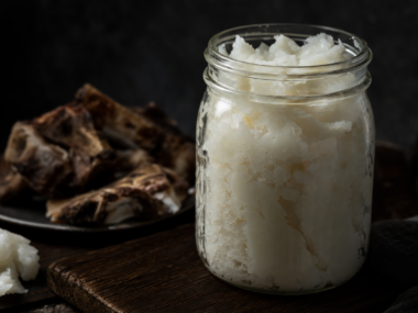 How long does beef tallow last - jar of beef tallow on dark wooden surface